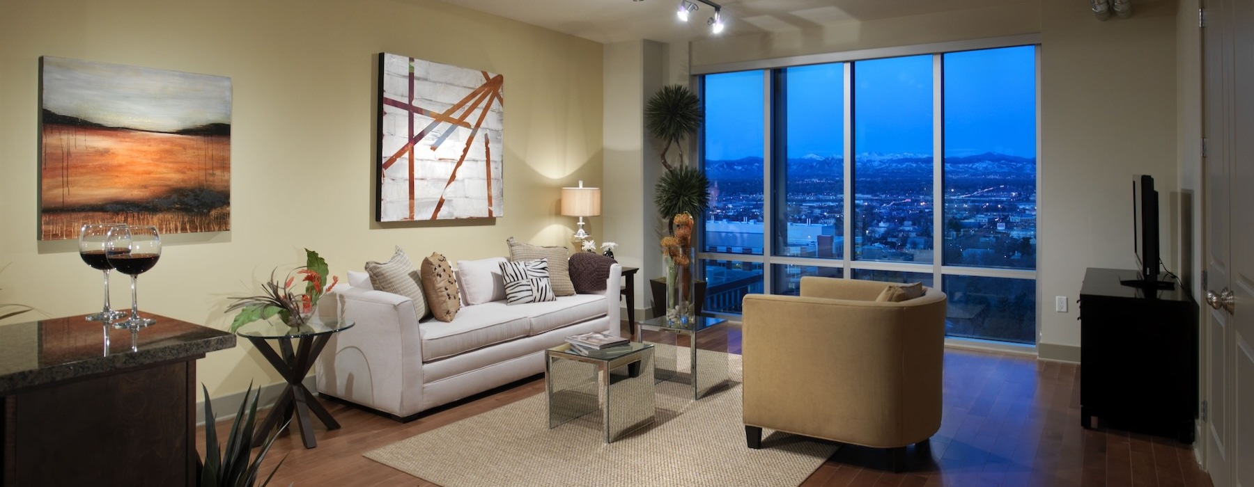 a living room with a couch and a chair