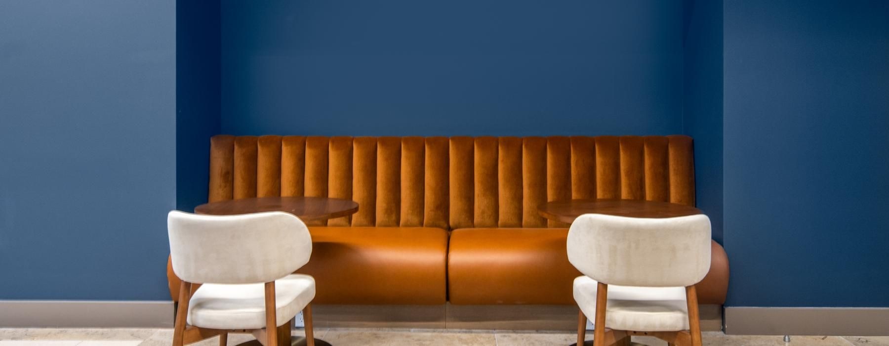 a couch and chairs in a room